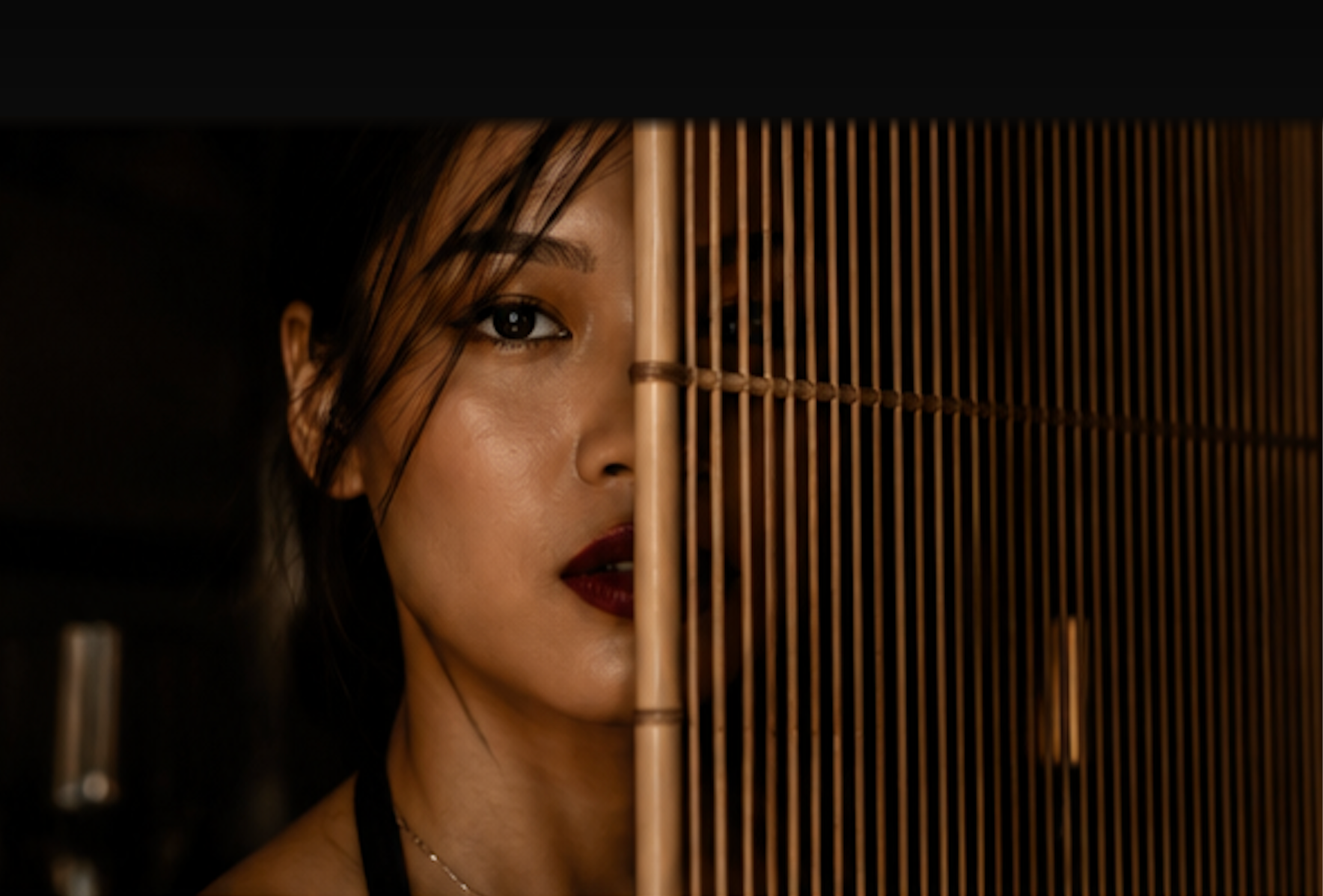 Woman with bamboo screen